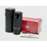 A Sigma Zoom II Multi-coated camera lens with box and case. 5924621