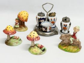 A collection of Early 20th Century salt and pepper shakers. Morley Staffordshire Pottery pixie