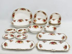 21 pieces of Royal Albert ‘Old Country Roses’ 2 serving bowls 23x19x5cm. 3 sandwich servers 30cm.