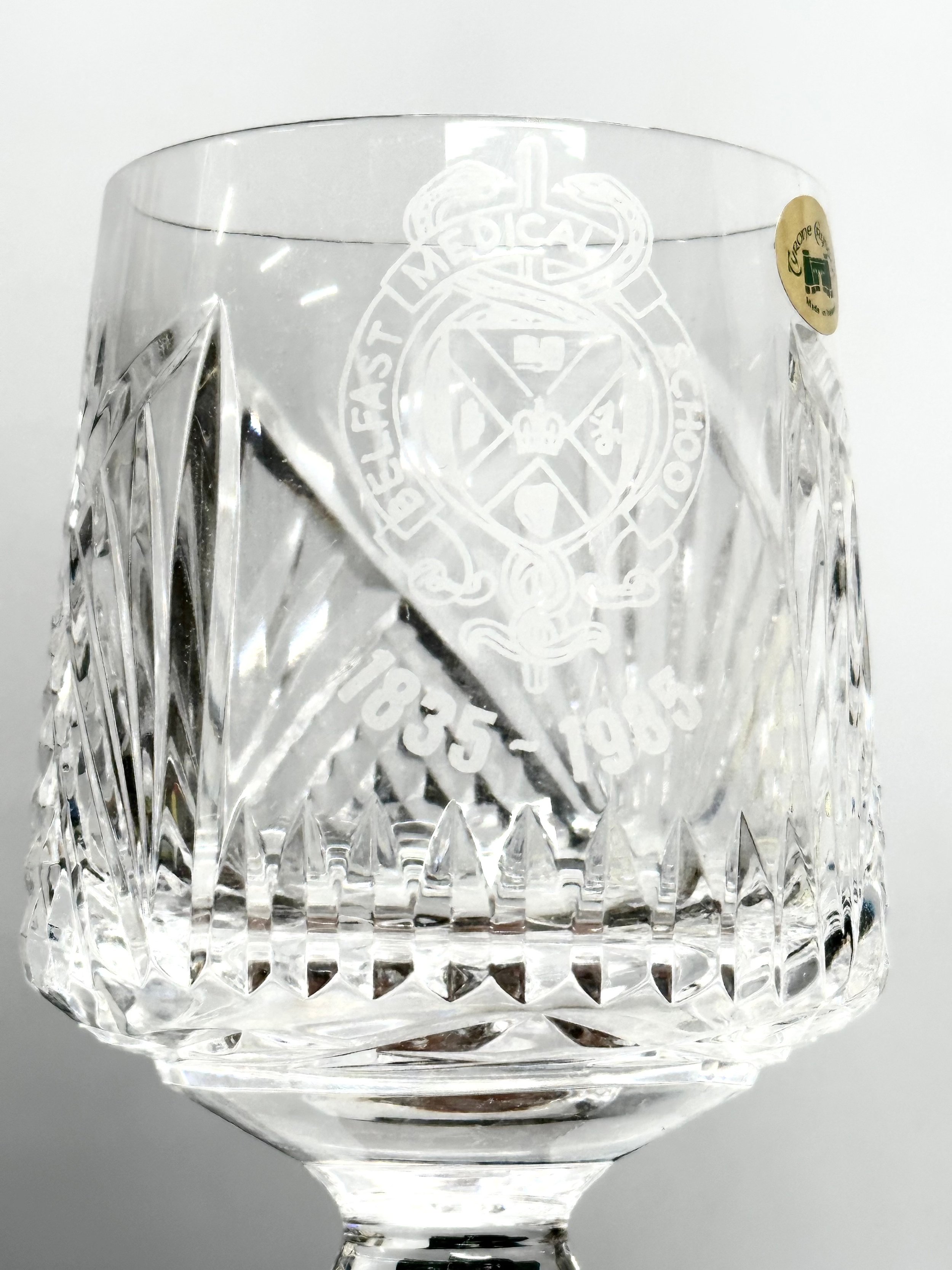 Tyrone Crystal with boxes. A pair of University of Ulster wine glasses 20cm. A Belfast Medical - Image 3 of 4