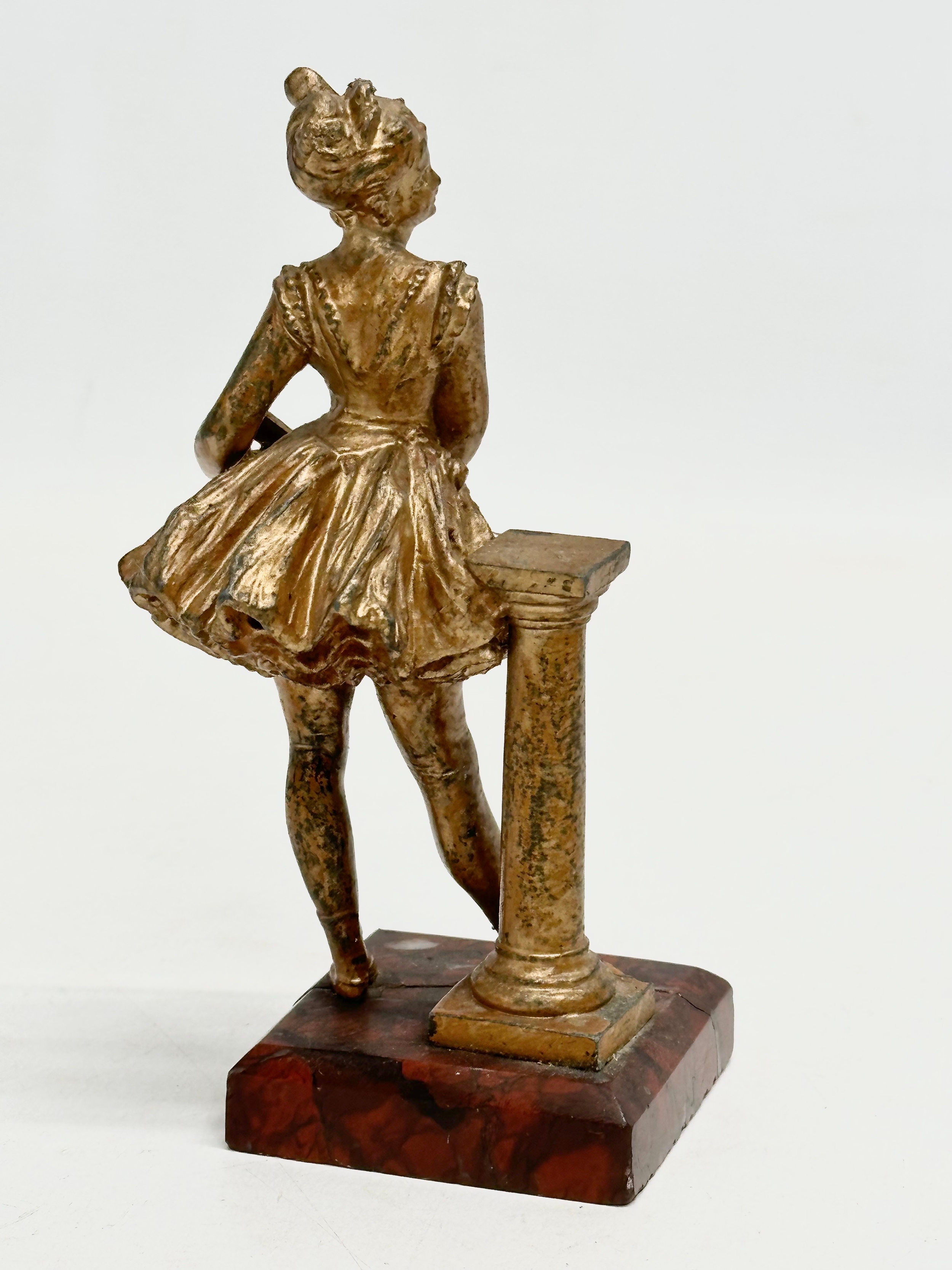 A late 19th century spelter figurine on marble base. 13cm - Image 4 of 4