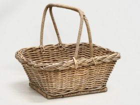 A good quality Mid 20th Century wicker basket. 54x42x47cm