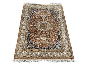 A large vintage Middle Eastern hand knotted rug. 192x284cm