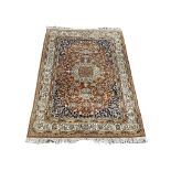 A large vintage Middle Eastern hand knotted rug. 192x284cm