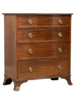A good quality Early 20th Century Georgian style mahogany bow front chest of drawers on splayed