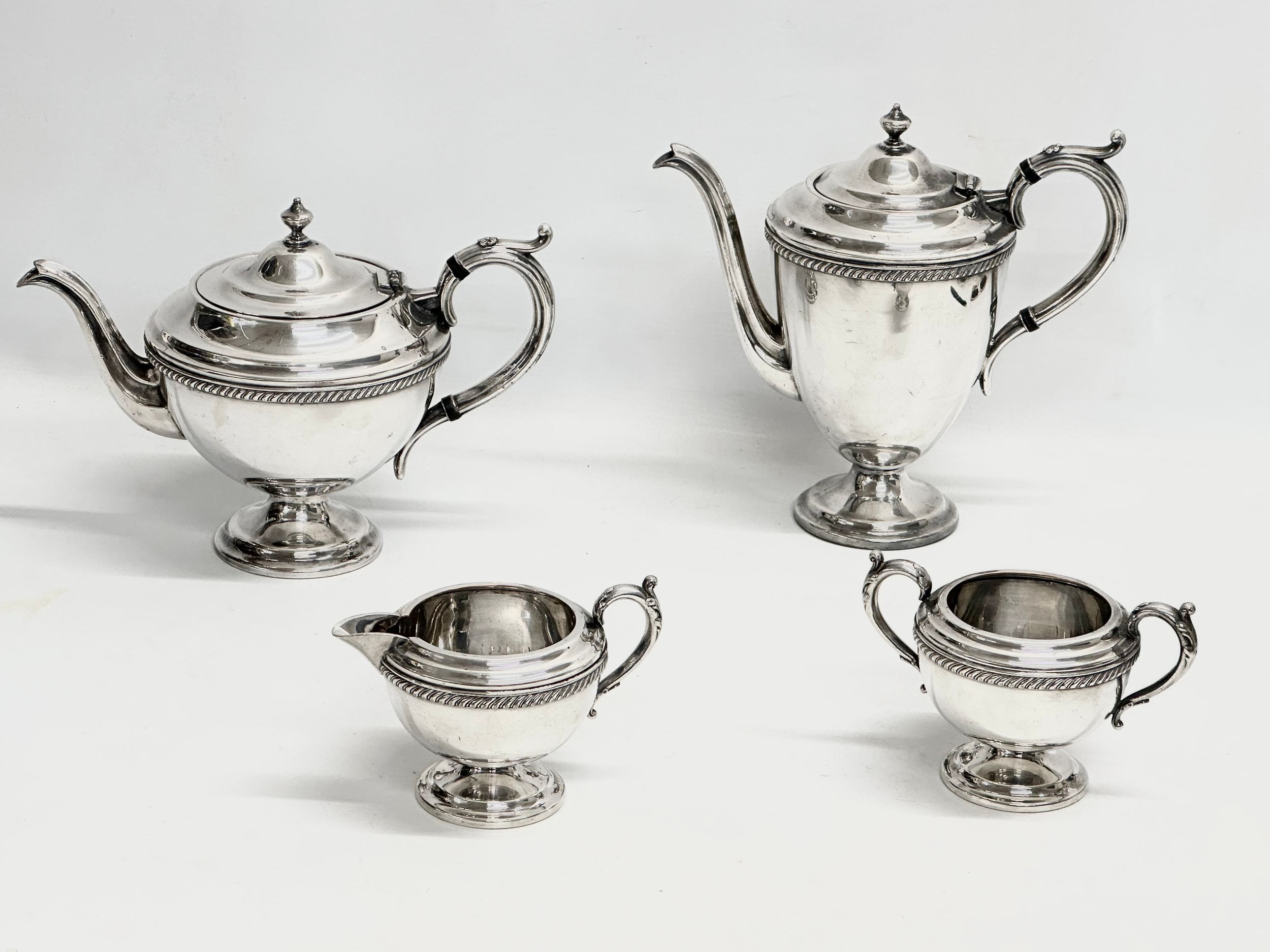 A 4 piece 20th Century E.P tea service. B.M Mounts.