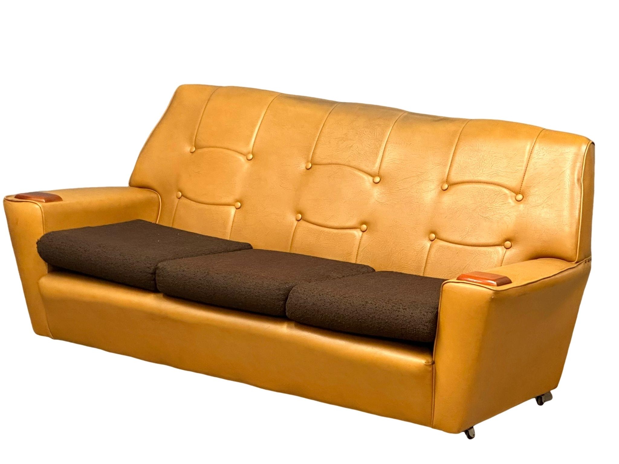 A Mid Century faux leather 3 seater sofa with teak padded arms. 1970’s. 184cm - Image 2 of 6