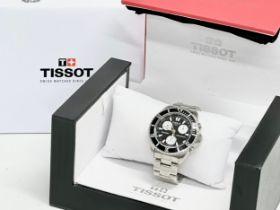 A Tissot Chronograph Sport watch with box. E662/762M