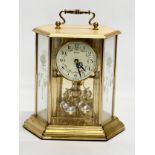 A 20th century German brass Anniversary clock by Benchmark. 21x15x22cm