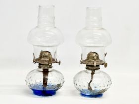 A pair of vintage oil lamps. 29.5cm