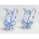 A pair of Late 19th Century Scottish baluster water jugs. 14x23cm