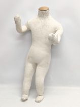 A 20th century child's flexible cotton mannequin. 65cm