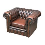 A deep button leather club armchair. 103x87x71cm