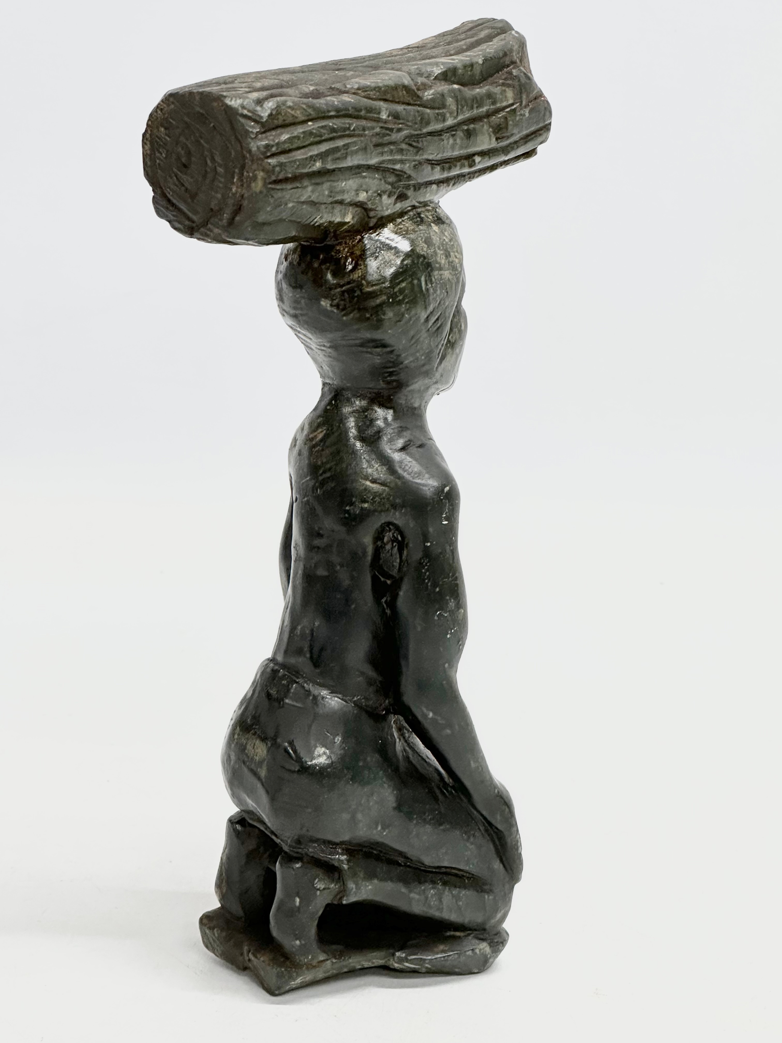 An early 20th century African painted stone figurine. 21cm - Image 4 of 5