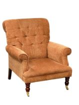 A Late Victorian style button back armchair on brass cup casters. 82x86x91cm