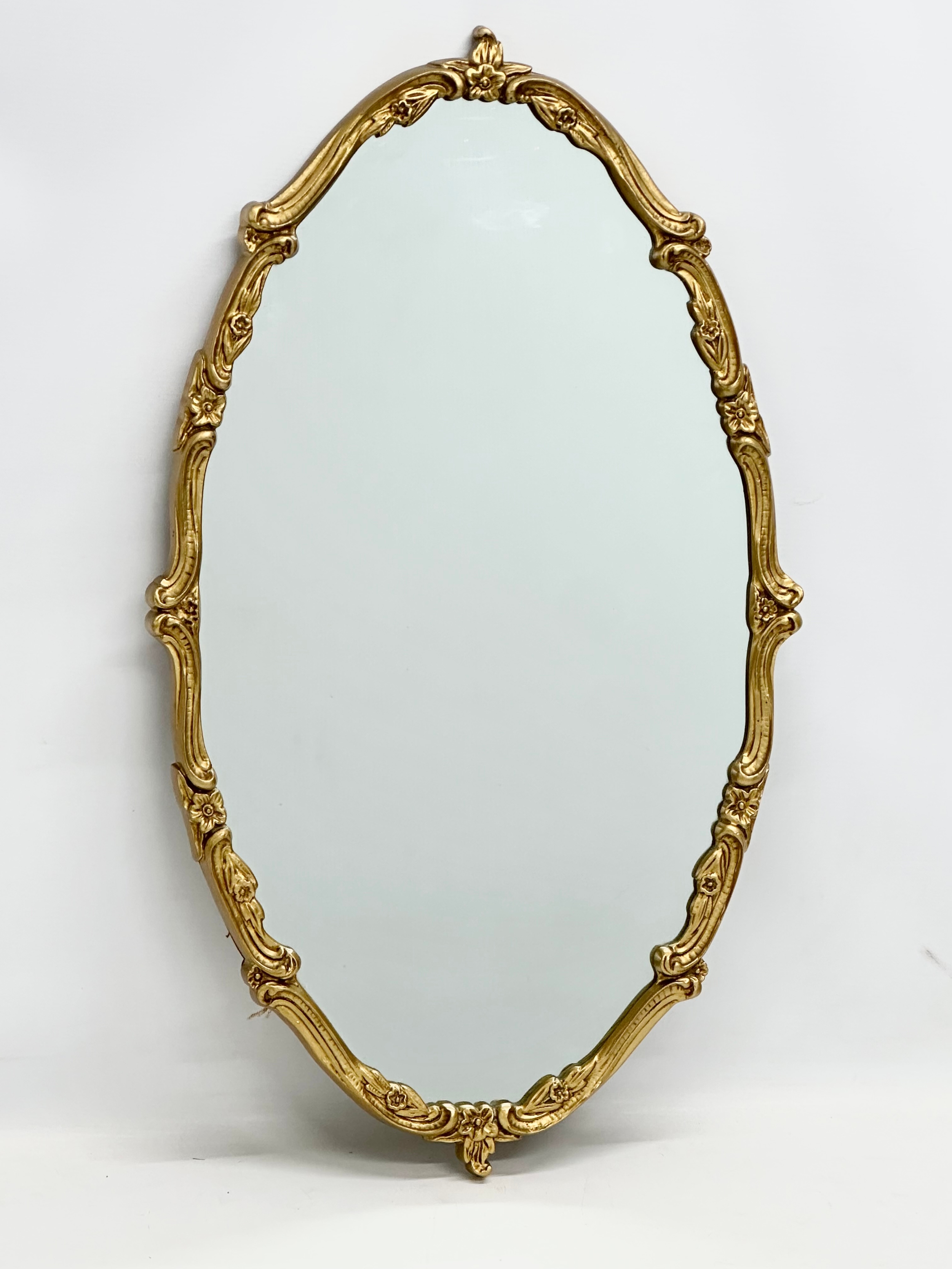 A vintage gilt framed mirror. 41x72cm