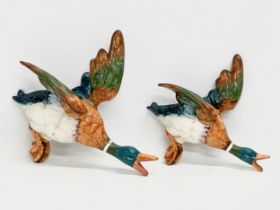 A pair of Mid 20th Century Beswick pottery flying ducks. 22x20cm