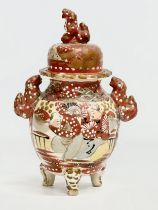 A Late 19th Century Japanese hand painted pottery urn with lid by Satsuma. Circa 1890. 15x23cm