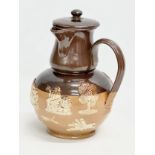 A Royal Doulton Lambeth ‘Harvest’ flagon with spout and sieve. Early 20th century. 17x15x25cm