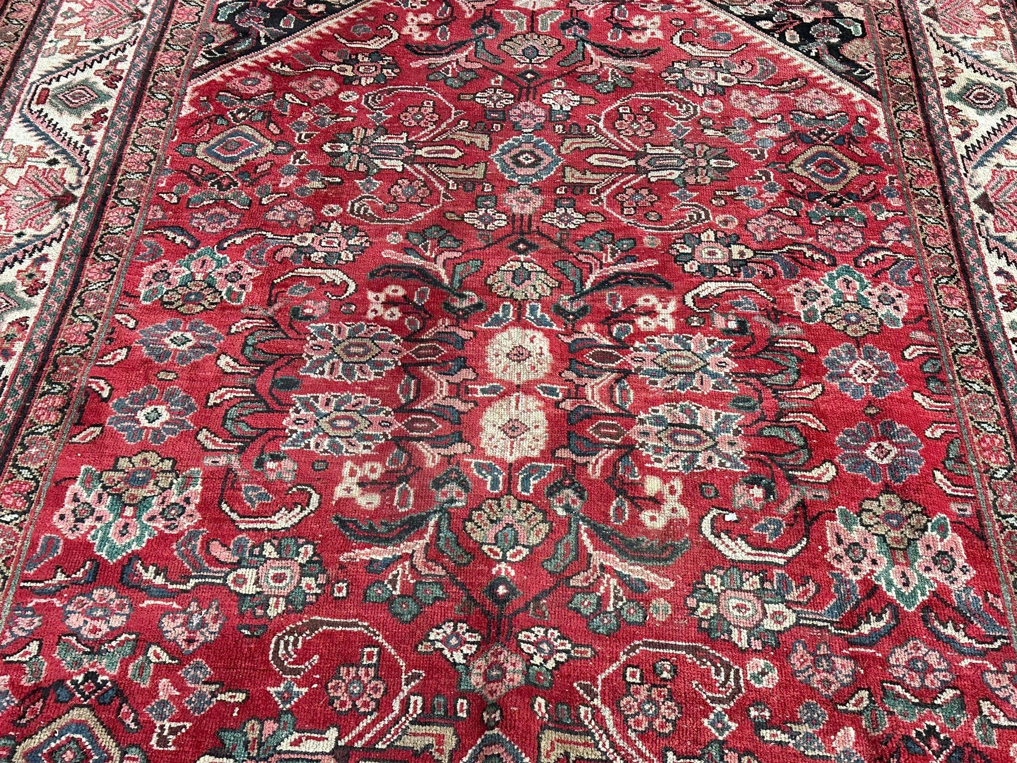 A large vintage Middle Eastern hand knotted rug. 339x236cm - Image 5 of 5