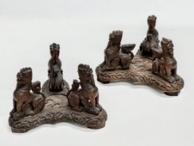 A pair of Late 19th Century Far Eastern carved elm stands. 21x20x13cm