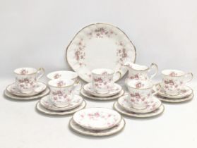 A Paragon 'Victoriana Rose' pottery tea service, including cake plate.