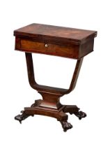 A good quality late William IV rosewood turnover games table on carved lion paw feet, circa 1835-40.