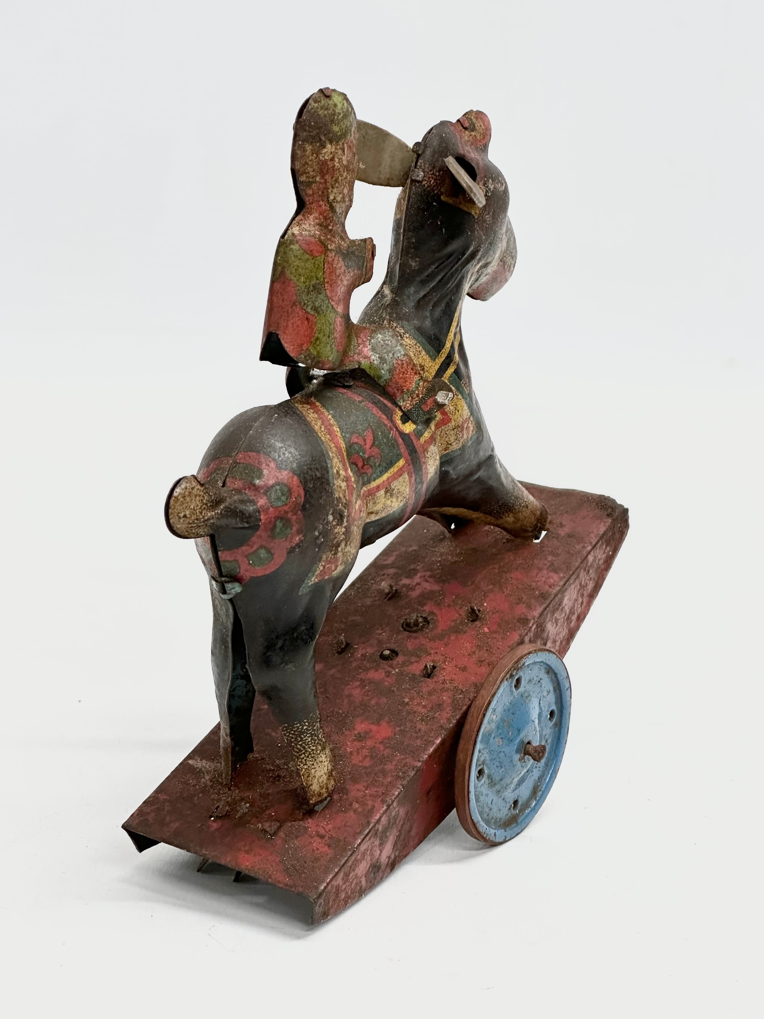A vintage ‘Peter Pan’ series Stubborn mechanical rocking clown on horse. 15x17cm - Image 5 of 5