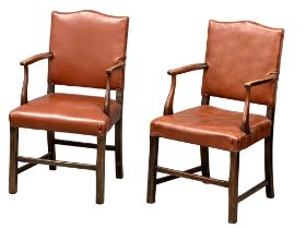 A pair of early 20th century, George III style oak armchairs.