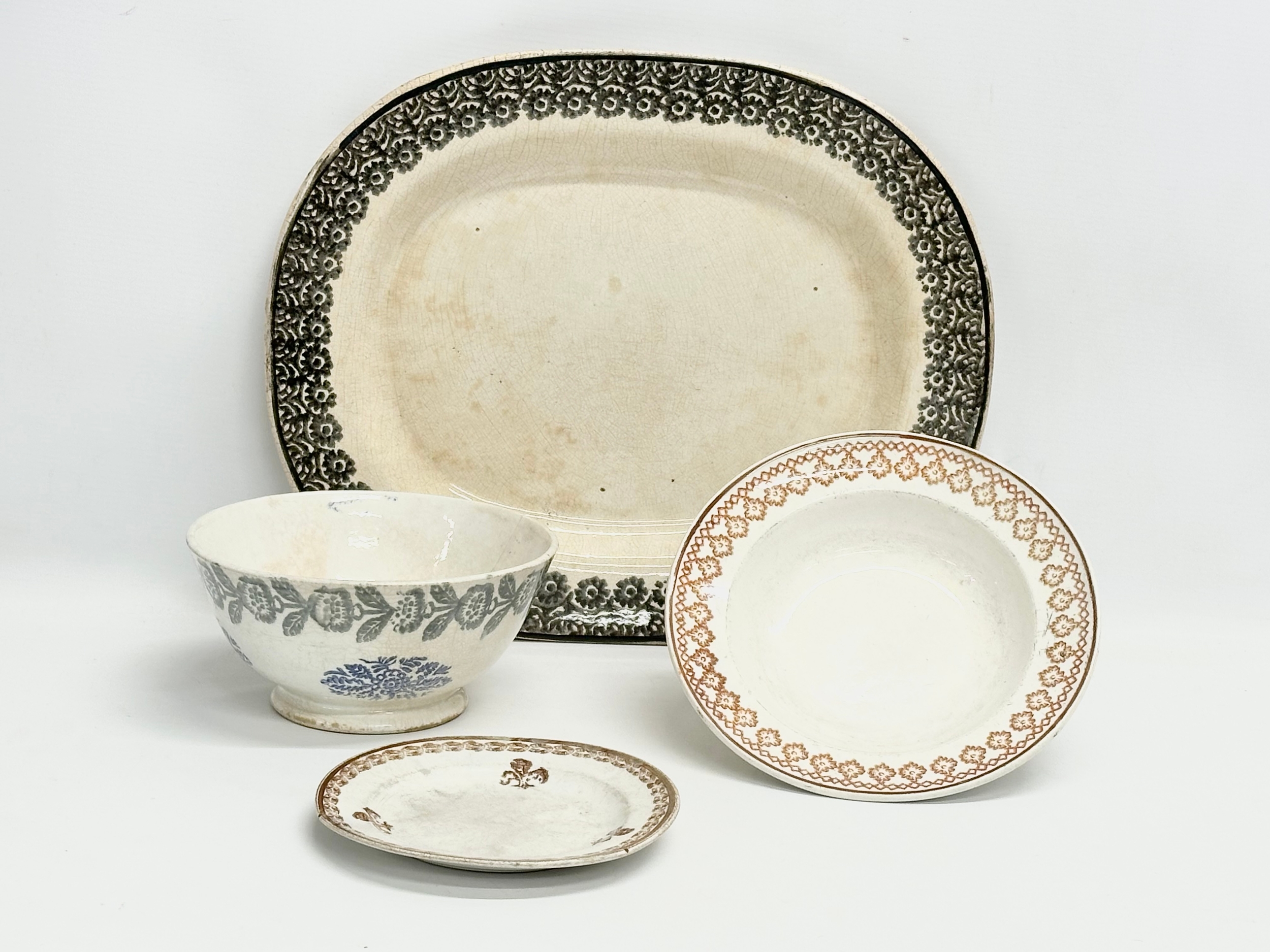 A collection of Mid 19th Century Sponge Ware. A Sponge Ware meat platter 39x32cm. A Sponge Ware bowl