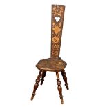 An Early 20th Century Pokerwork spinning chair. Circa 1900-1910.