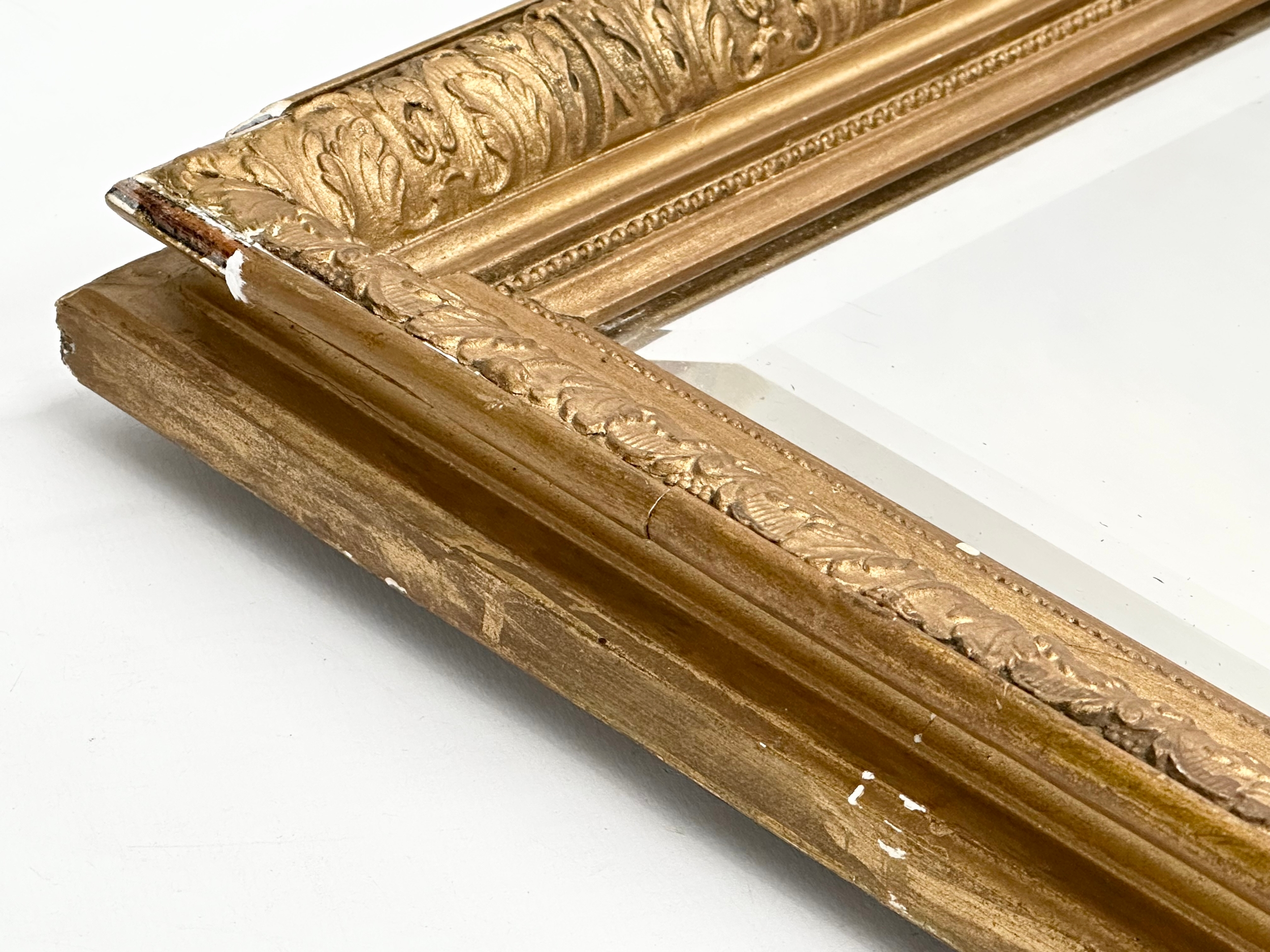 A Late Victorian gilt framed bevelled mirror. 56x61.5cm - Image 2 of 4