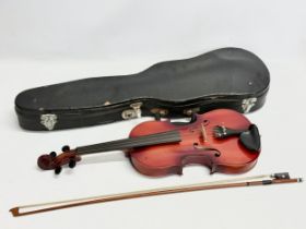 A violin in case.