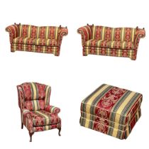 A 4 piece suite. A pair of sofas, wingback armchair and stool.