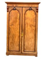 A Victorian mahogany double door fitted wardrobe. 137x63x215cm