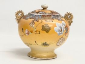 A Late 19th Century signed Japanese Meiji period 2 handled urn with lid by Satsuma. 15.5x14x15cm