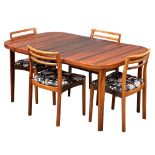 A Danish Mid Century rosewood extending dining table and 4 chairs. Closed 101x101x73cm. 1 leaf