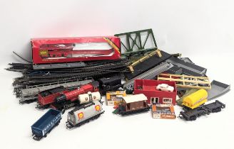 A collection of Hornby model railway tracks, carriages, set, etc.