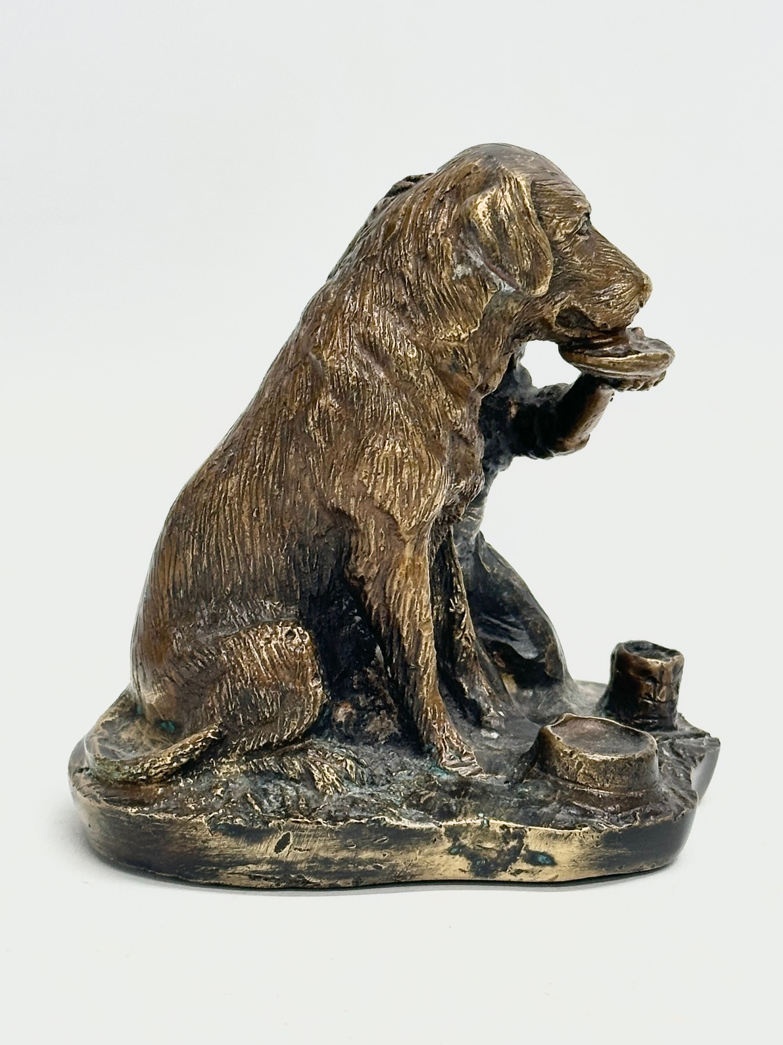 A bronze boy feeding dog figurine. Signed Schultz. 11x11cm - Image 2 of 5