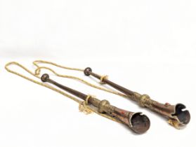 A pair of Early / Mid 20th Century Tibetan copper and brass horns.