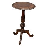 A Mid Victorian oak pedestal table on cabriole legs. 44x71cm