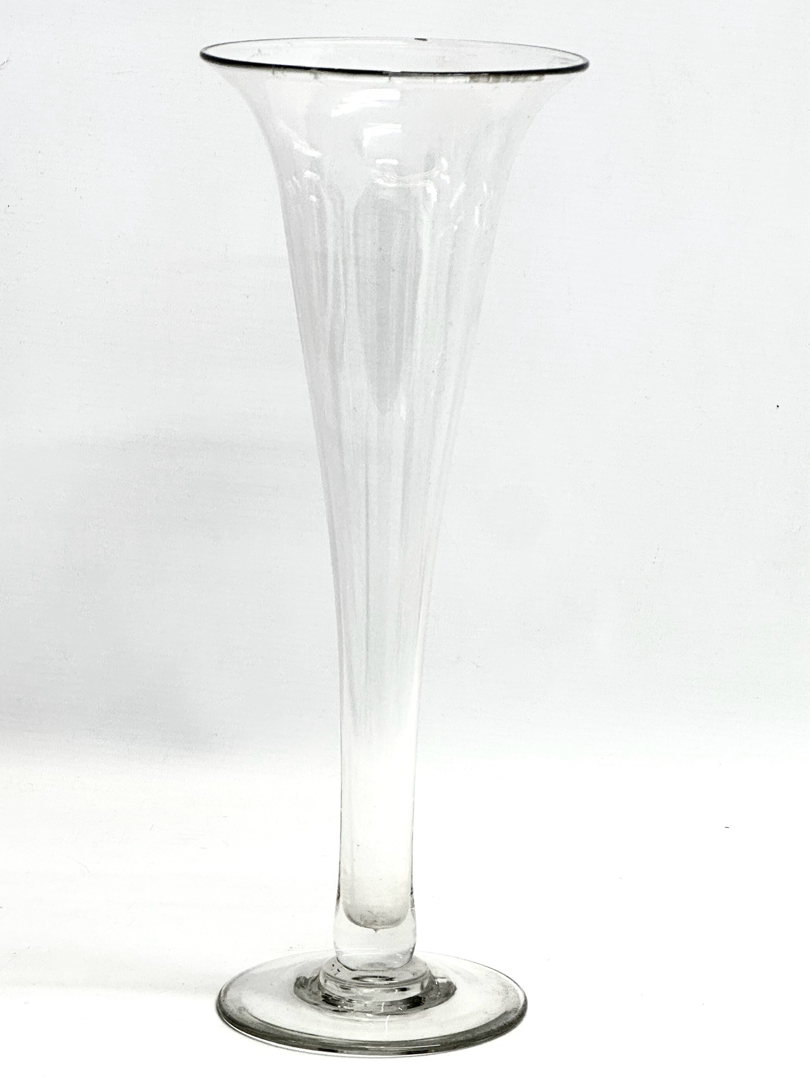 A large late 19th century Victorian glass trumpet vase. Circa 1890. 14x35.5cm