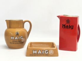 3 pieces of Haig Scotch Whisky advertising memorabilia by Carlton Ware. Including 2 jugs and an