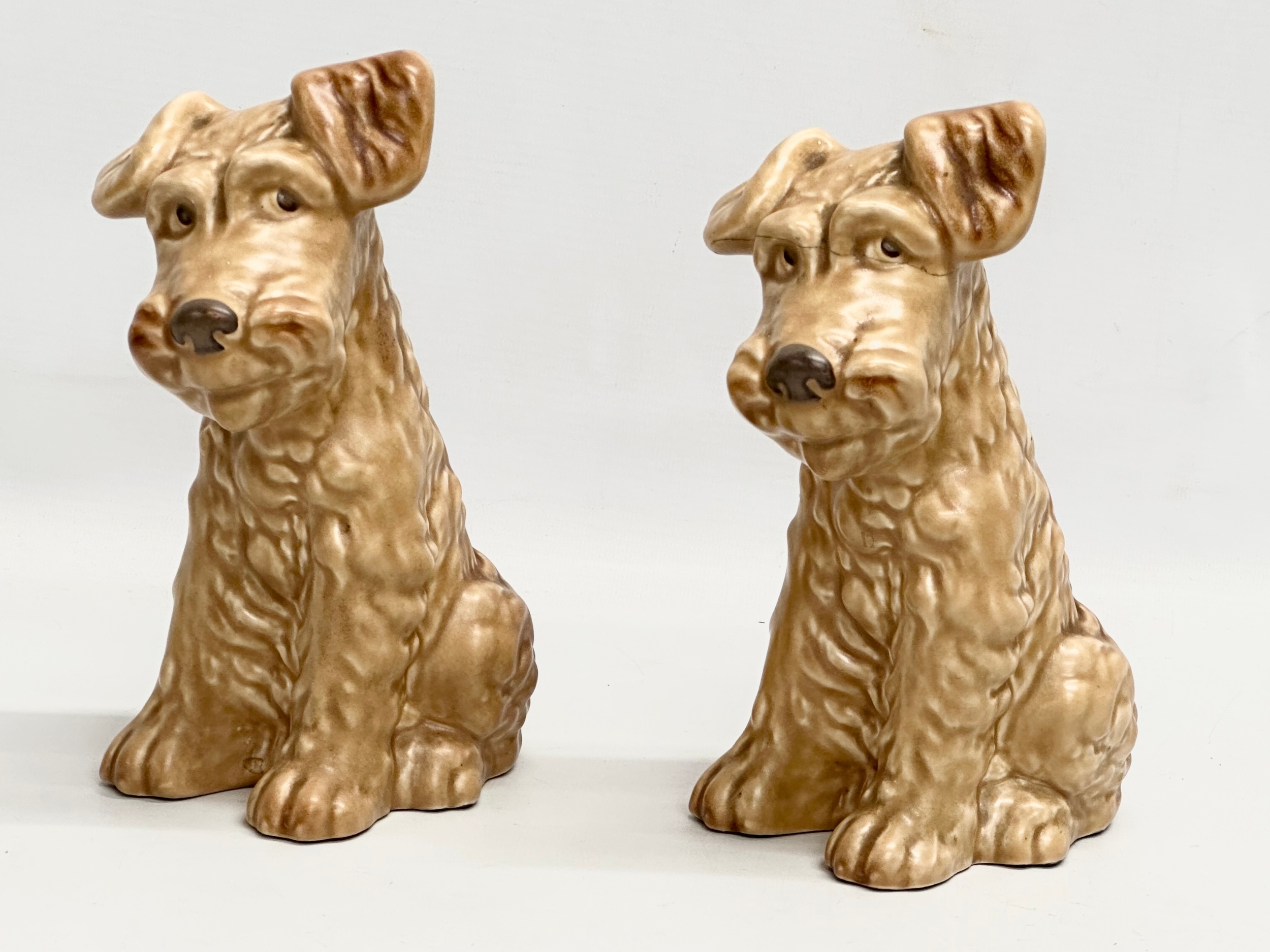 A pair of Mid 20th Century Sylvac Pottery dogs. 20.5cm