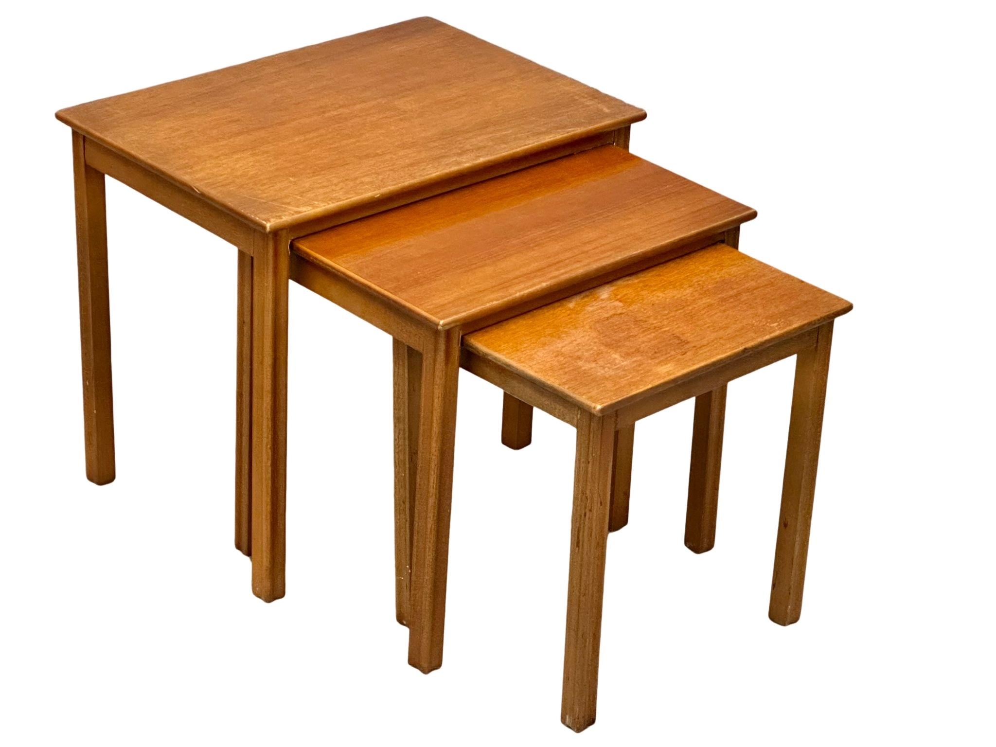 A Mid Century teak nest of tables