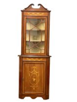 An early 20th Century Sheraton Revival Inlaid mahogany corner display cabinet with astragal glazed