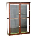 A large Early 20th Century mahogany shops display cabinet with 4 glass panels and shelves.