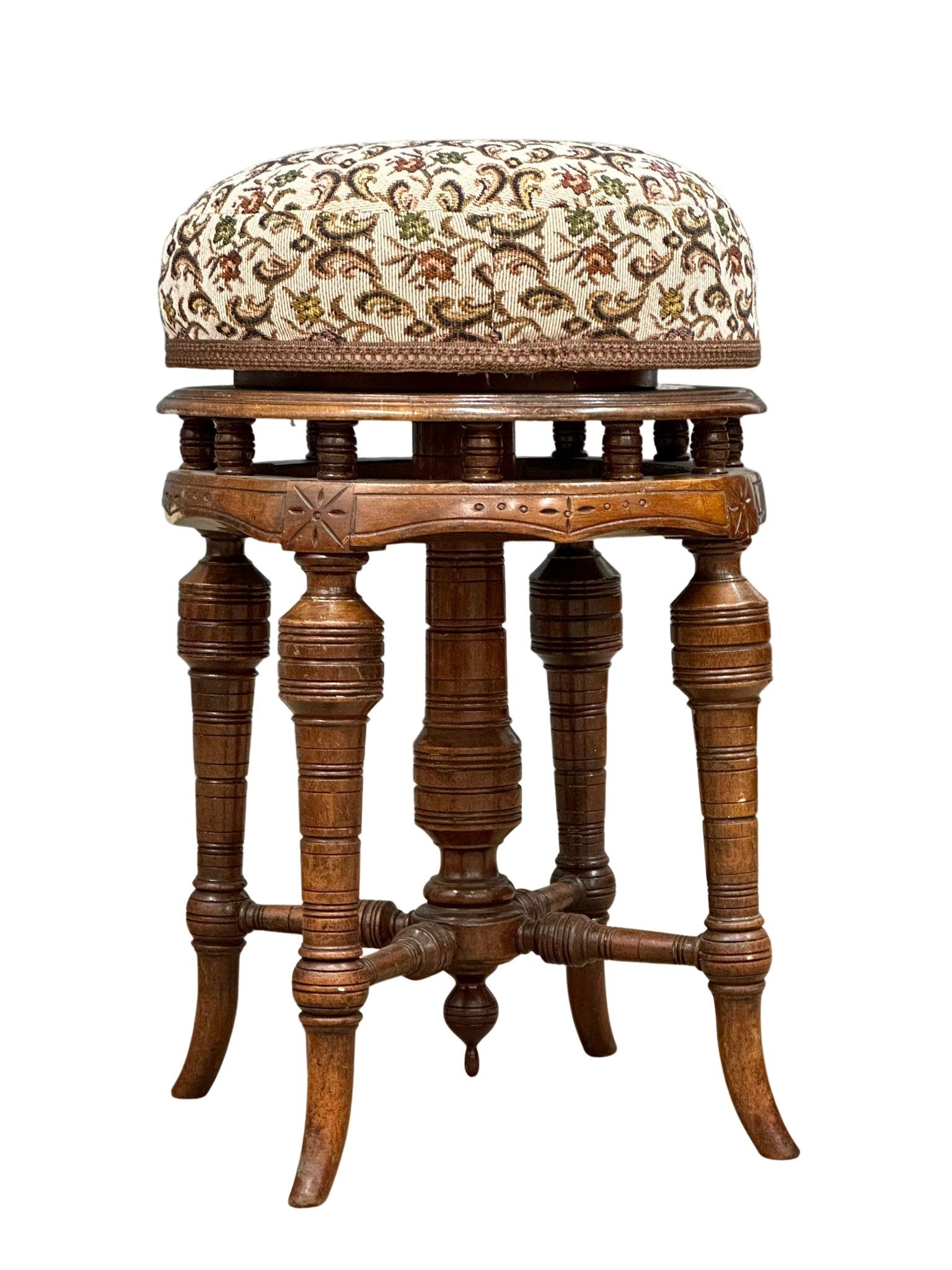 A late Victorian walnut revolving piano stool. Circa 1880-1890 - Image 5 of 5