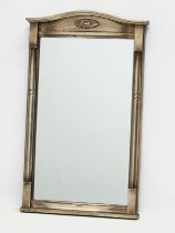 A late 20th century French Empire style pier mirror. 37x60cm