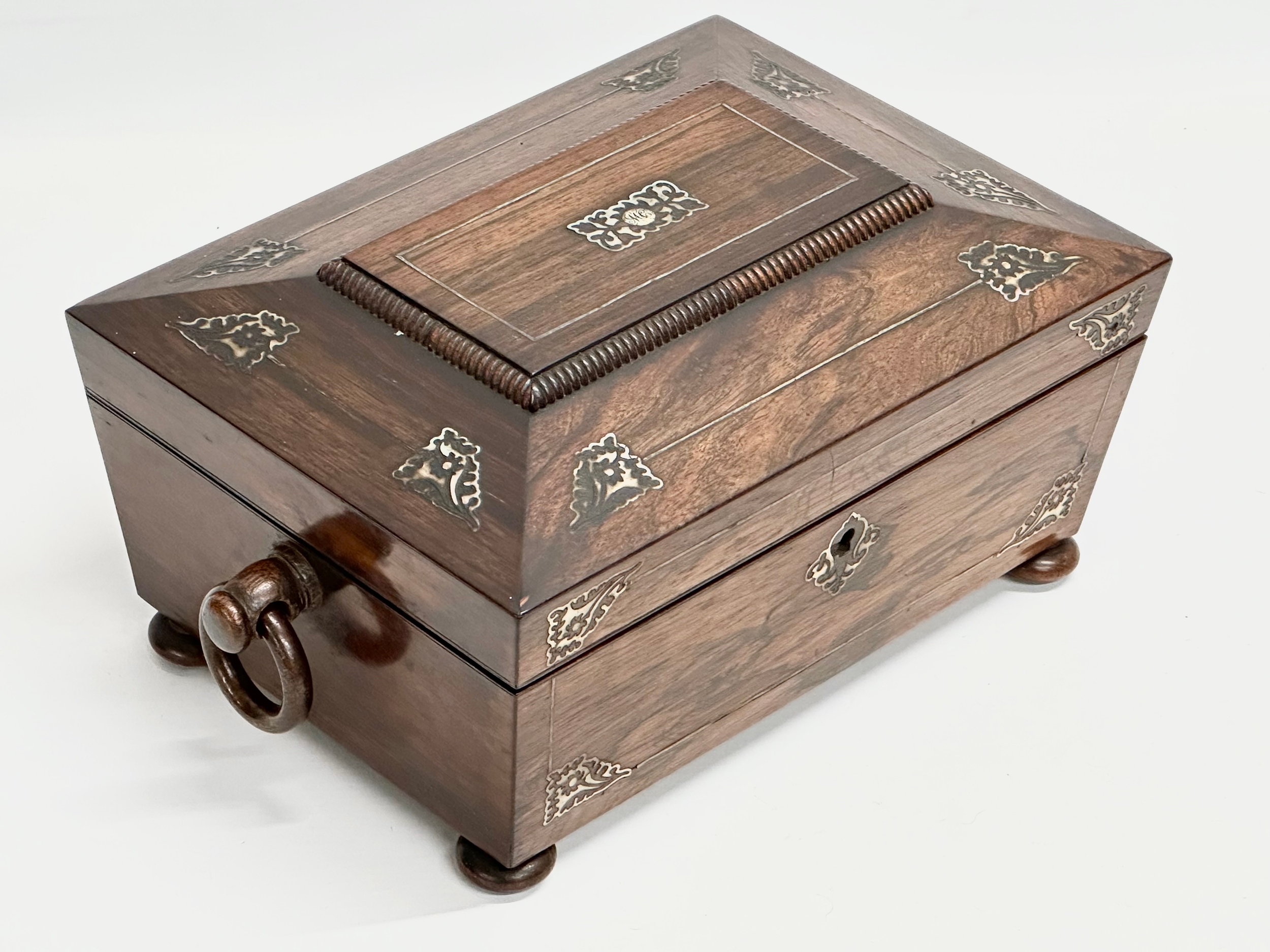 A Regency rosewood and Mother of Pearl sarcophagus shaped sewing box. Early 19th Century. Circa - Image 3 of 7